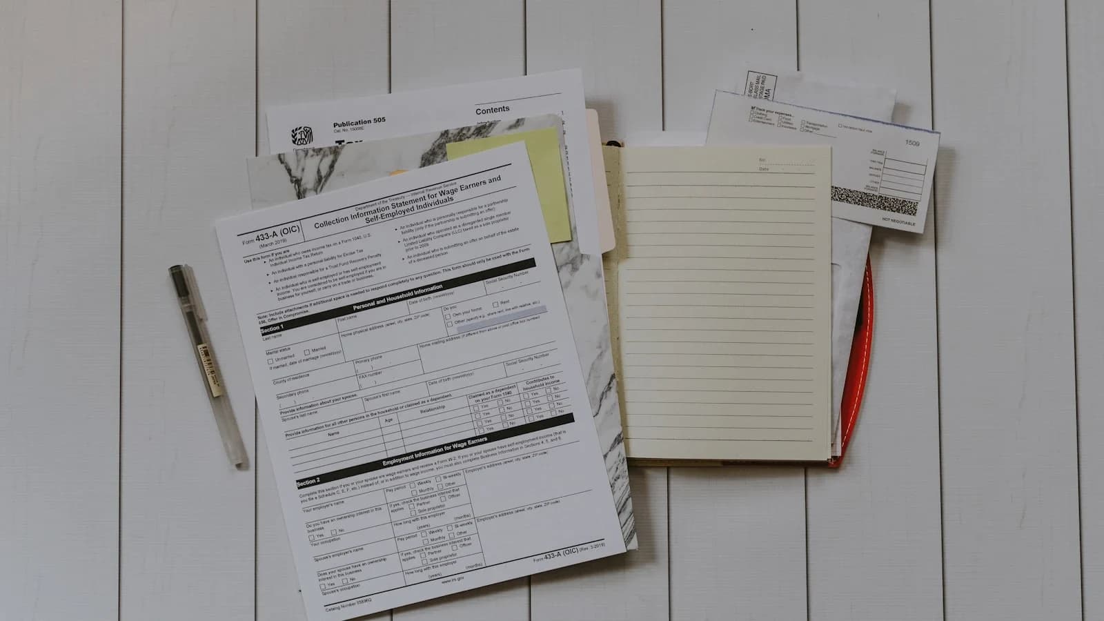 Small business owner reviewing a compliance checklist at a desk