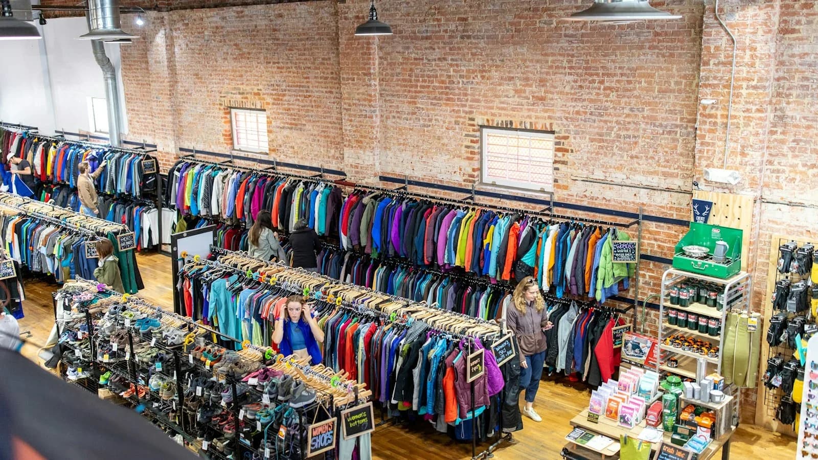 Small retailer checking inventory to prevent shrinkage
