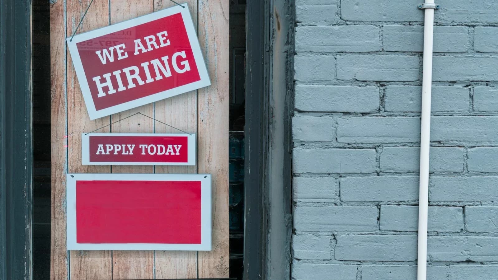 Small business owner welcoming first employee