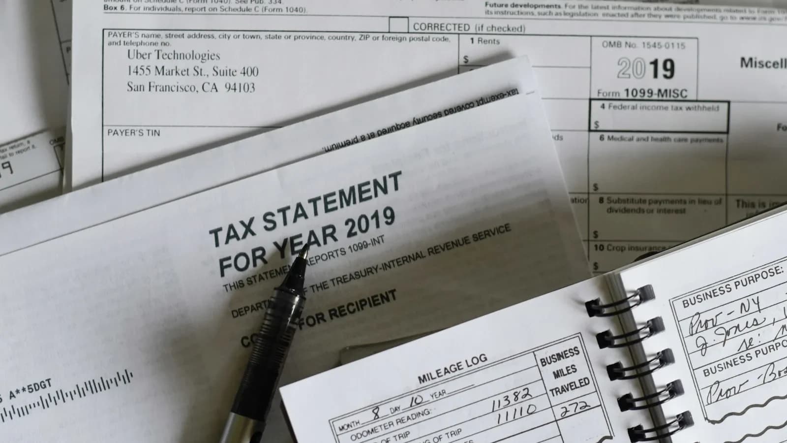 Small business owner reviewing sales‑tax dashboard on laptop