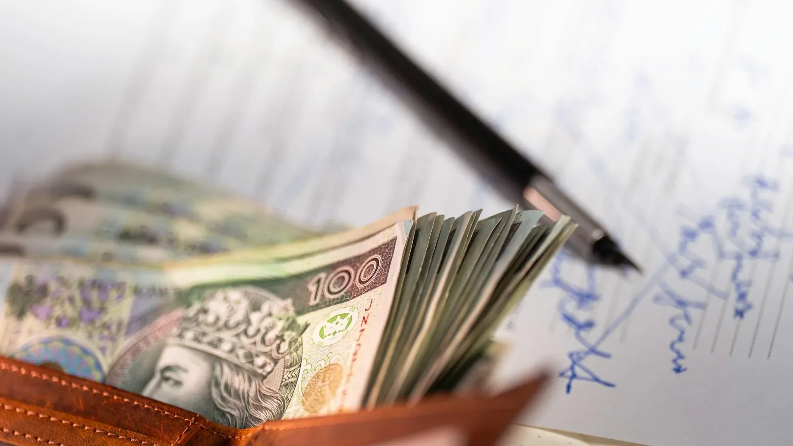 Small business owner reviewing a weekly cash‑flow forecast on a laptop