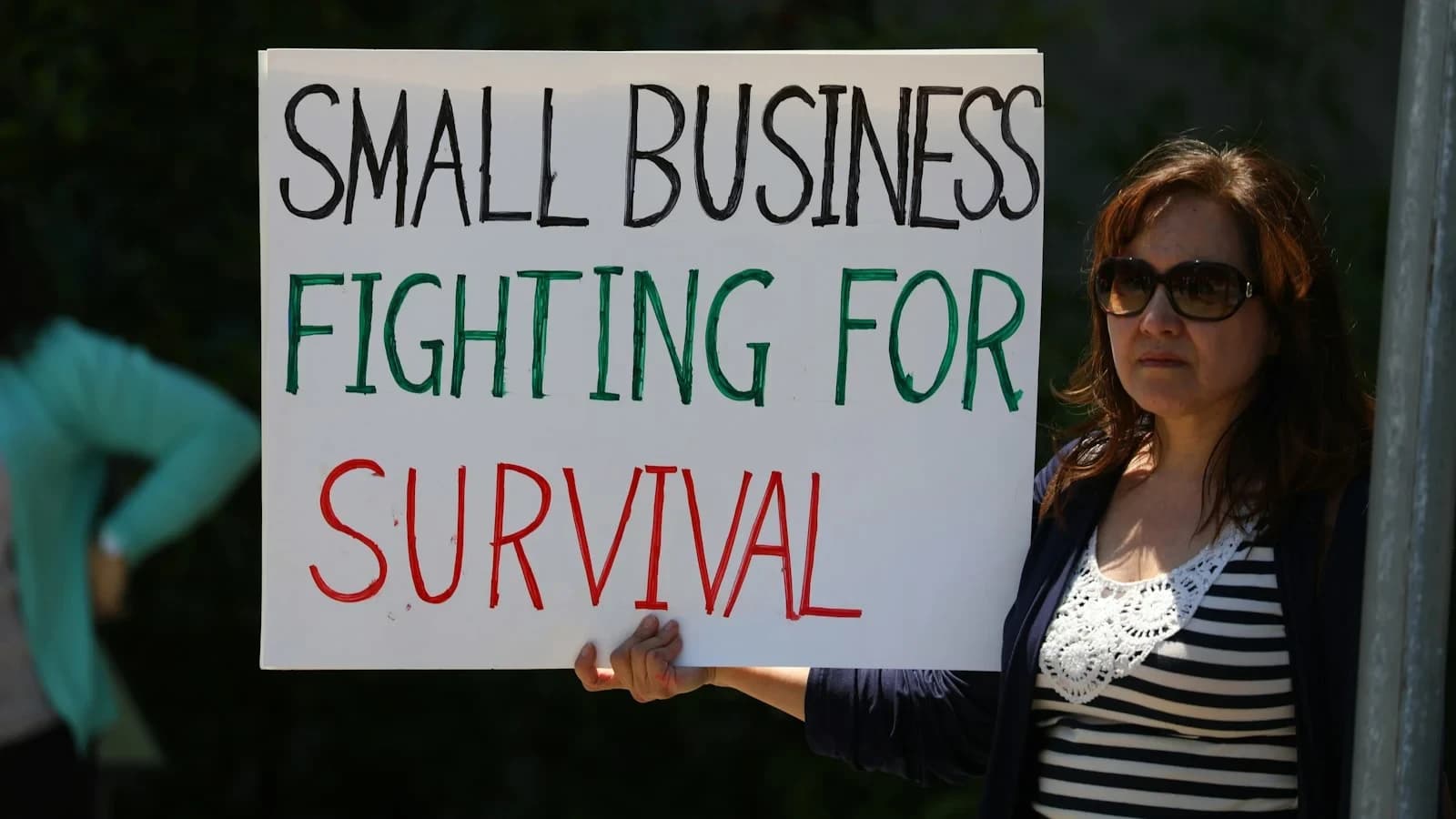 Small business owner conducting a professional termination meeting