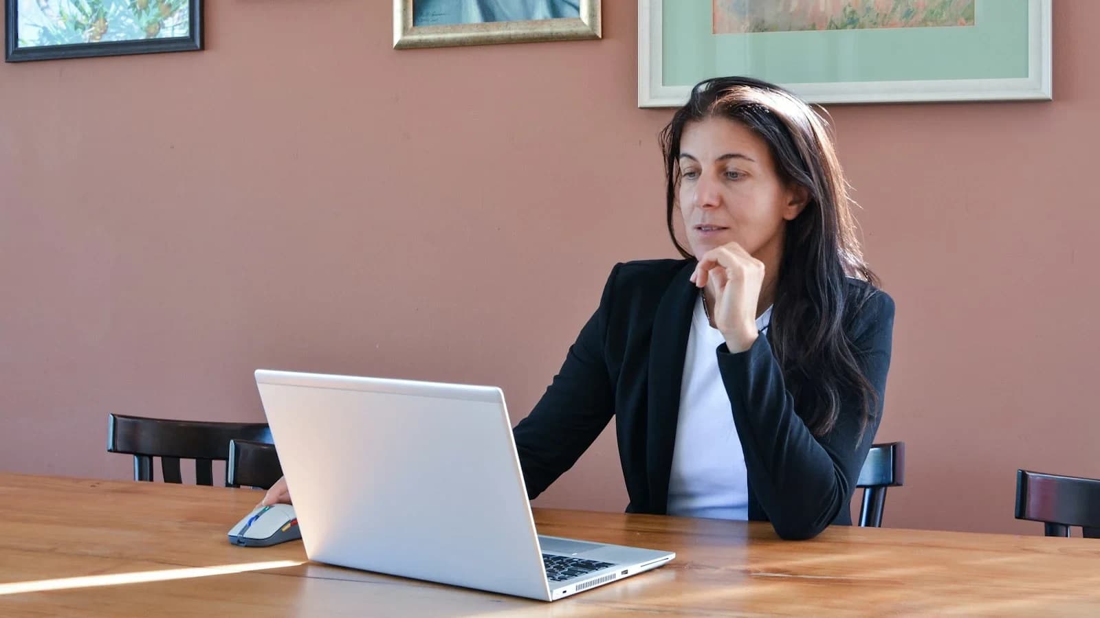 Busy owner drafting a concise response to an online review