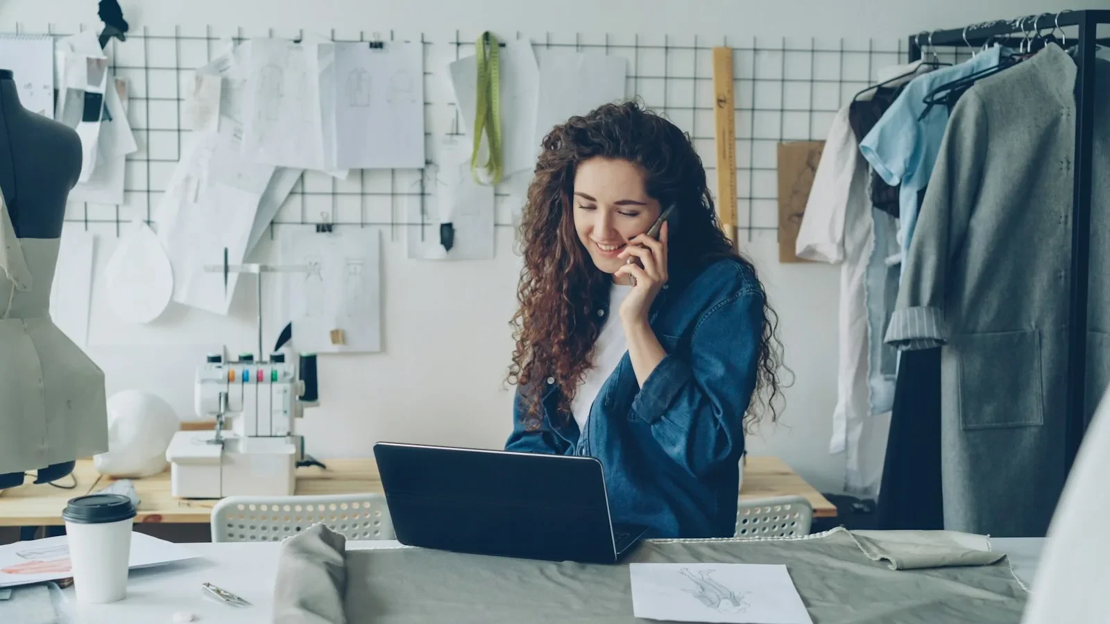 Small business owner reviewing a marketing budget spreadsheet at a desk