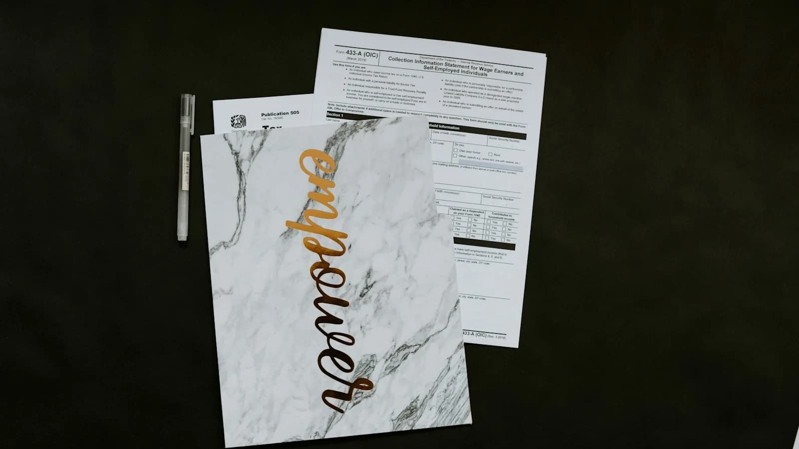 Small business owner reviewing overdue invoice checklist on laptop