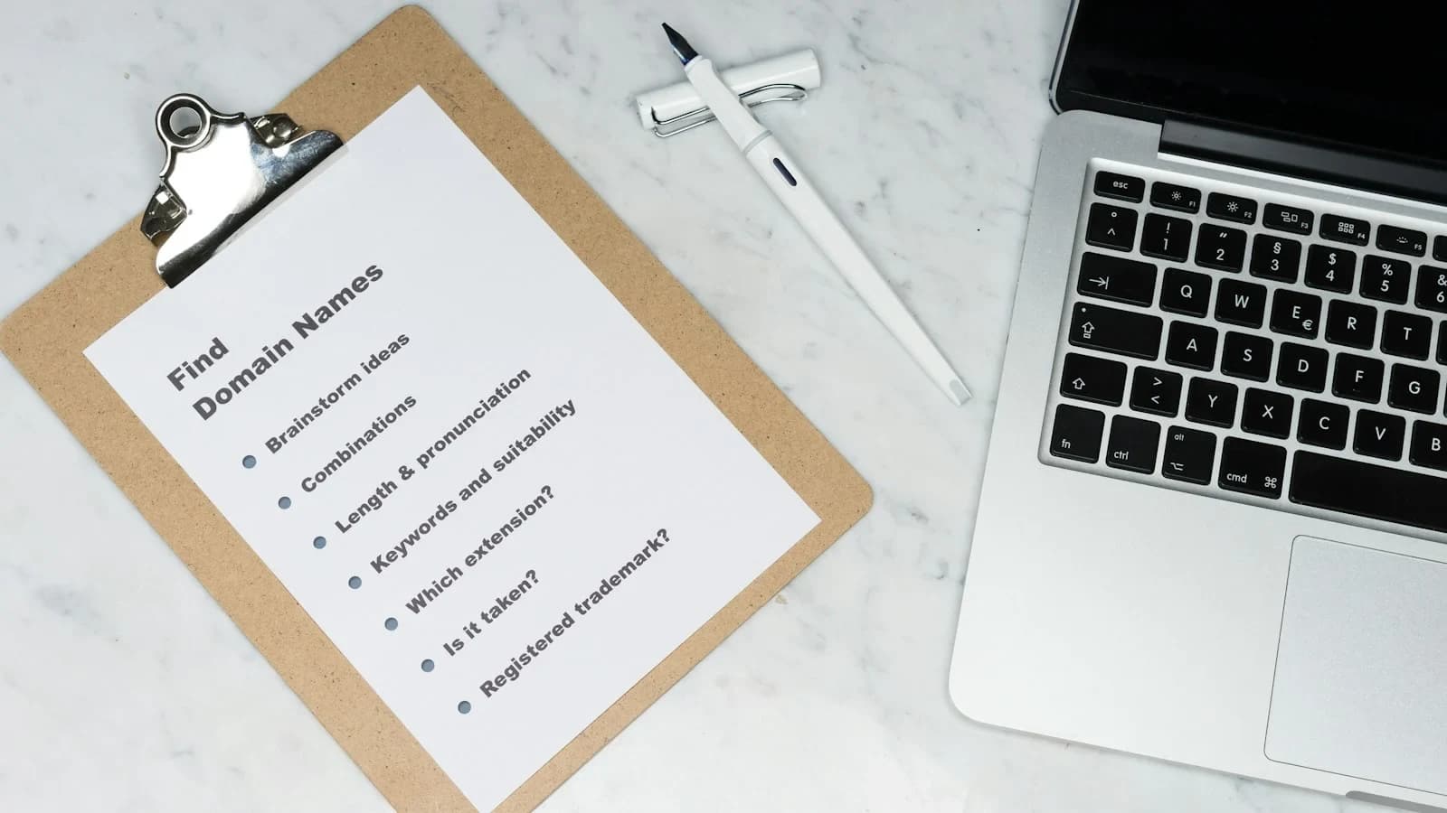 Small business owner reviewing a termination checklist with manager in a professional office setting