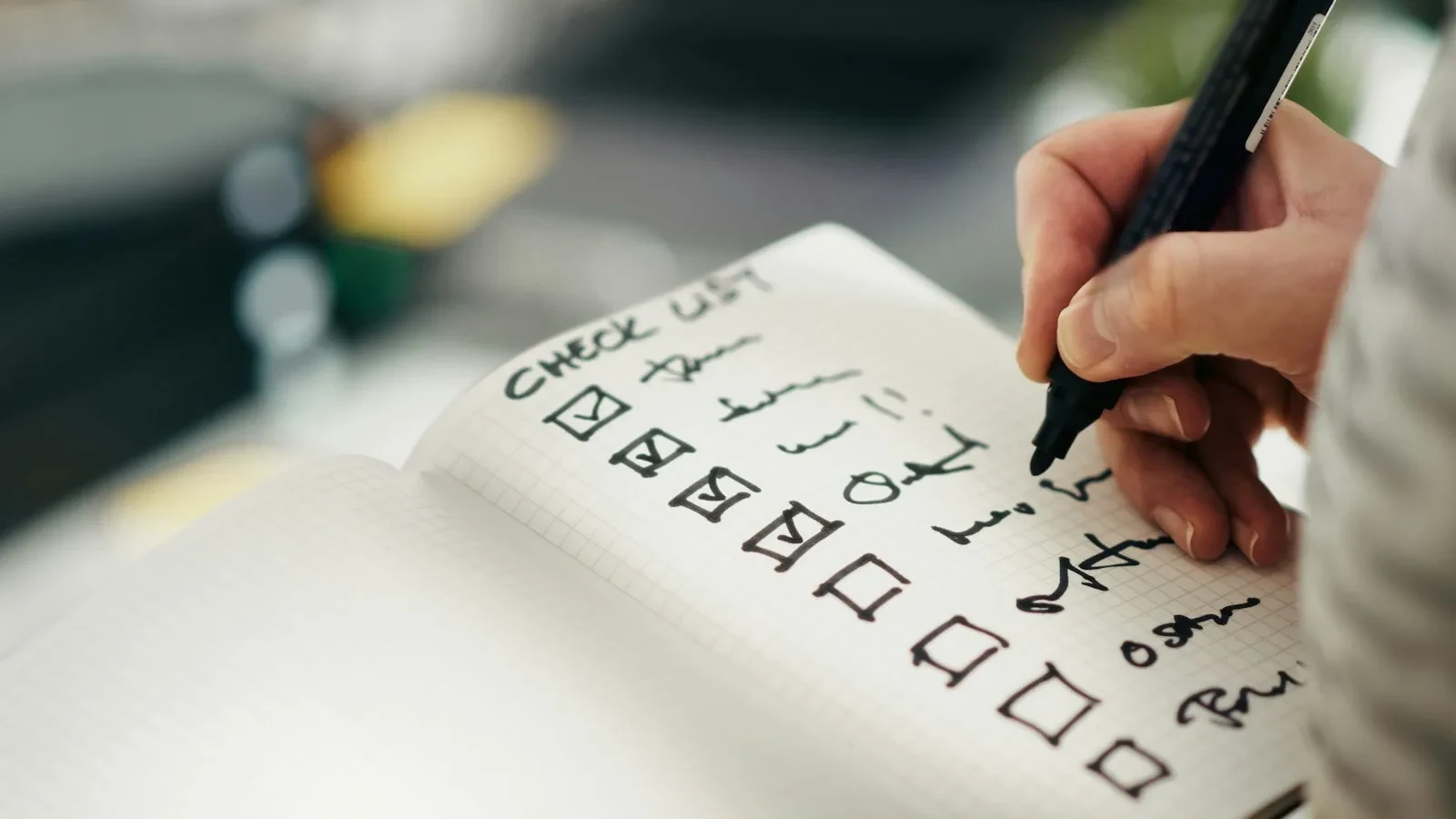 Small business owner reviewing pricing spreadsheet