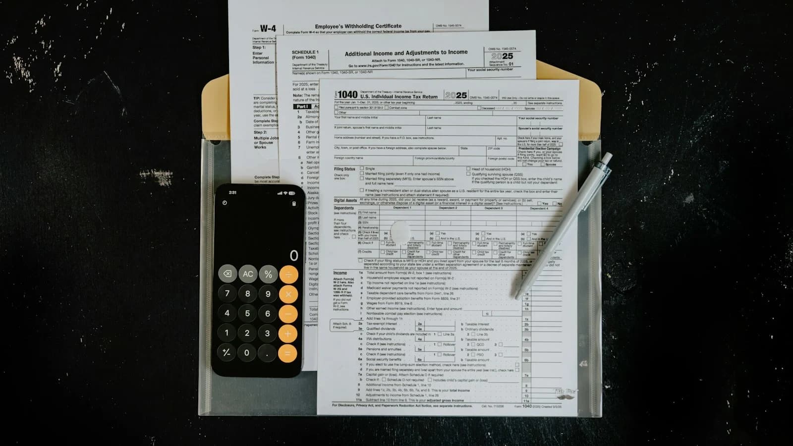 Small business owner using automated tax software on a laptop in a bright office